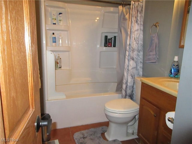 full bathroom featuring tile patterned flooring, vanity, shower / tub combo, and toilet