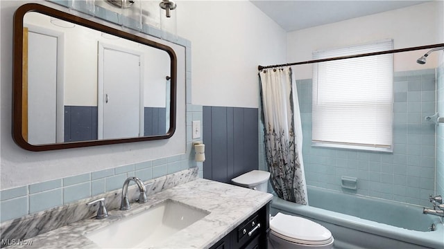 full bathroom with vanity, toilet, and shower / bathtub combination with curtain