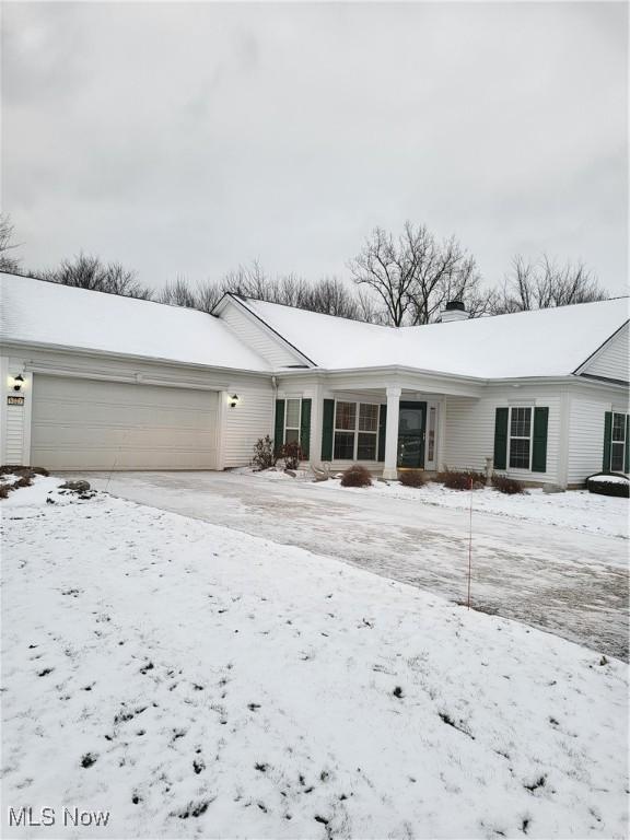 single story home with a garage