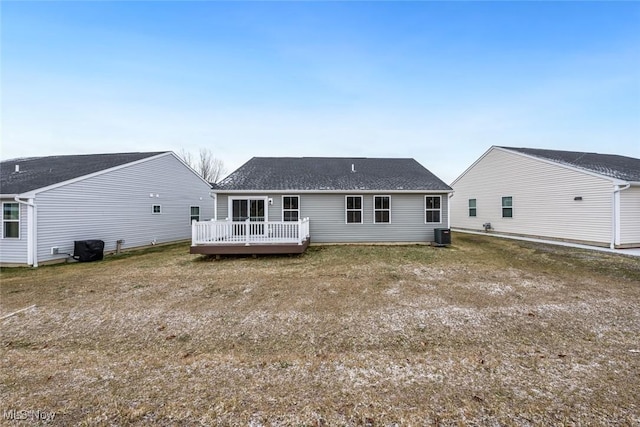 back of property featuring a deck and central AC unit