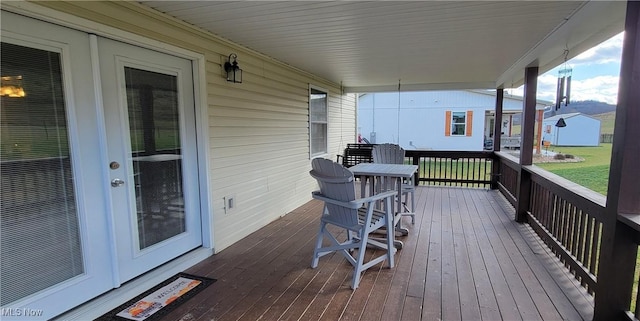 wooden terrace with covered porch