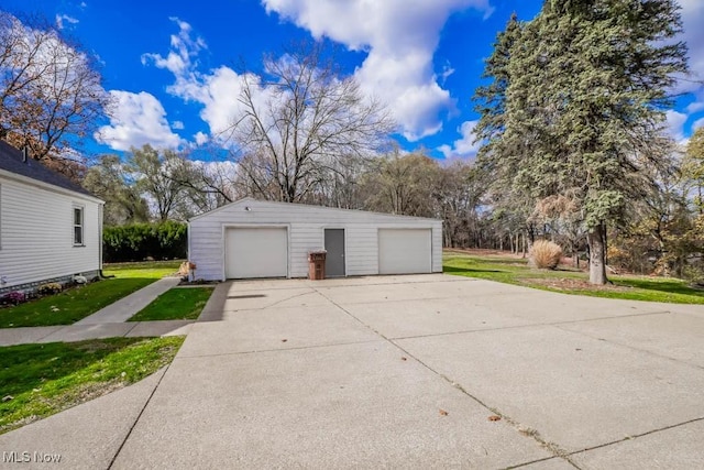 garage with a lawn