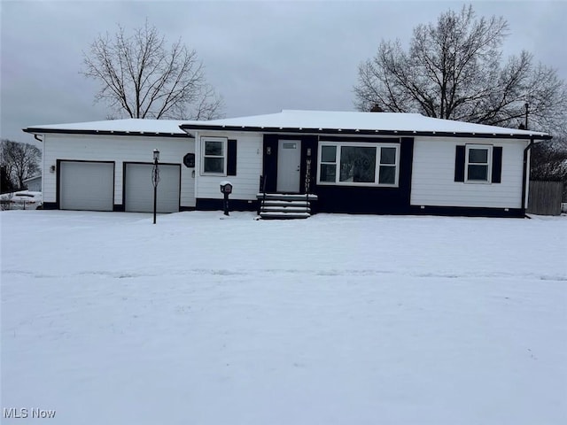 single story home with a garage