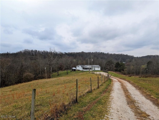 view of road with a rural view