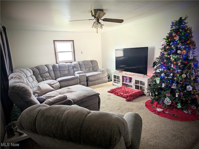 living room with carpet flooring and ceiling fan