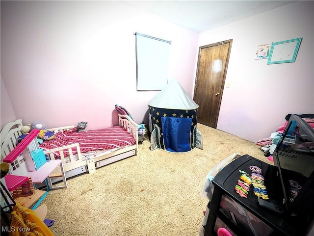 bedroom featuring carpet flooring