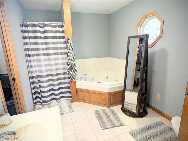 bathroom with tile patterned floors and shower with separate bathtub