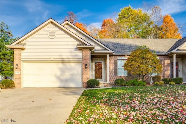 single story home featuring a garage