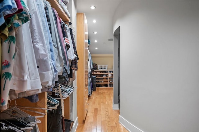 walk in closet featuring wood-type flooring