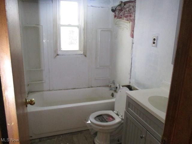 full bathroom featuring vanity, toilet, and shower / tub combination