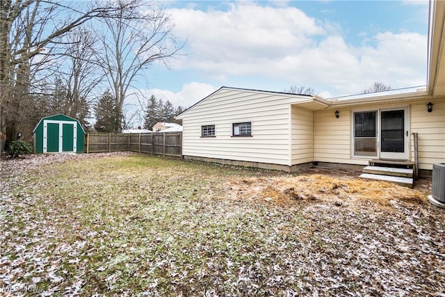 view of property exterior with a storage unit and central air condition unit