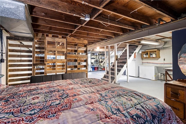 bedroom featuring concrete flooring