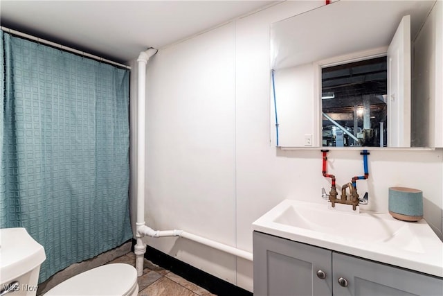 full bathroom featuring tile patterned flooring, vanity, shower / tub combo, and toilet