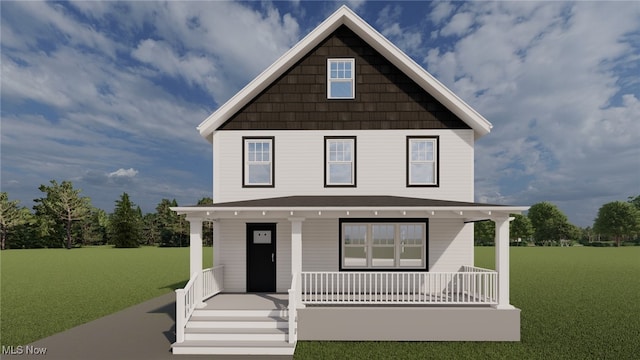 view of front of property with covered porch and a front yard