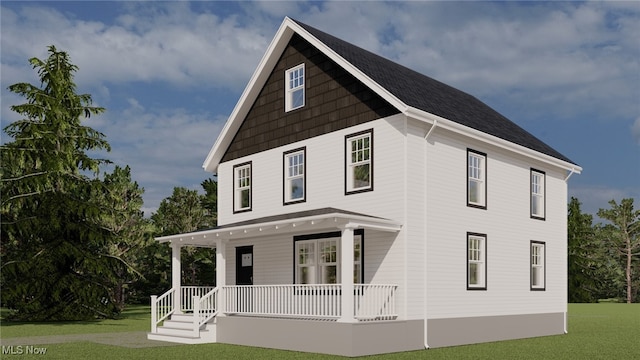 view of front facade featuring covered porch and a front lawn