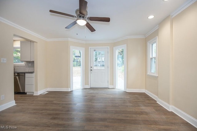 foyer entrance with ceiling fan, dark hardwood / wood-style flooring, and a healthy amount of sunlight