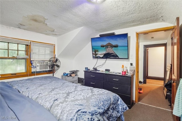 bedroom featuring carpet flooring, lofted ceiling, cooling unit, and a textured ceiling