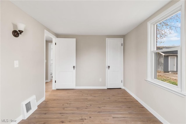 empty room featuring light wood-type flooring