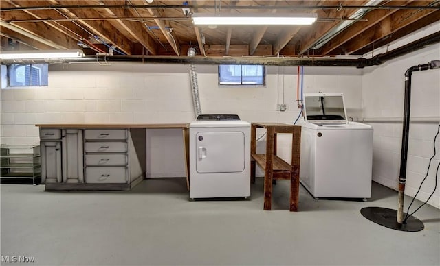 laundry room featuring separate washer and dryer