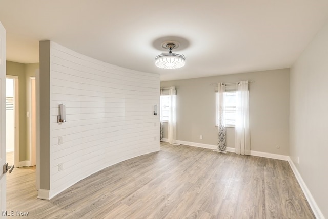 unfurnished room featuring light wood-type flooring