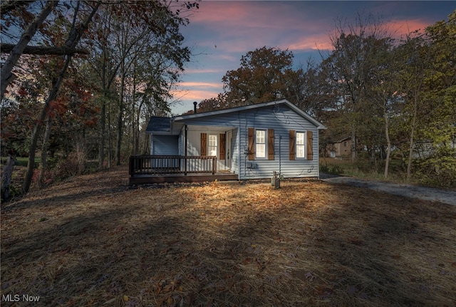 view of front of property with a deck