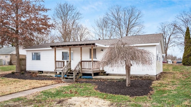 237 Front St, Philo, OH 43771 - view of front facade featuring a porch and roof with shingles