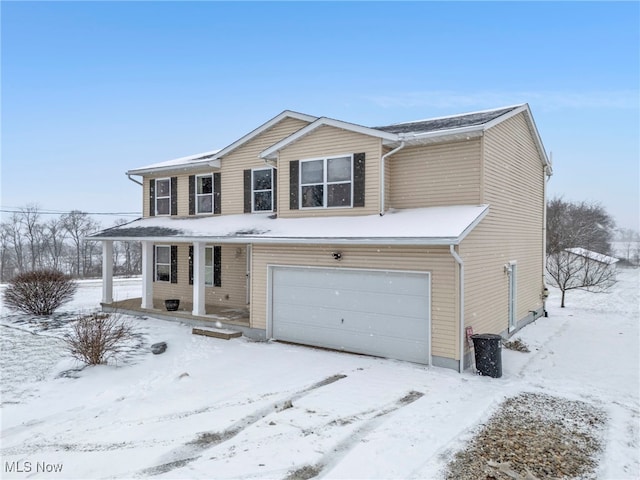 view of front of home with a garage