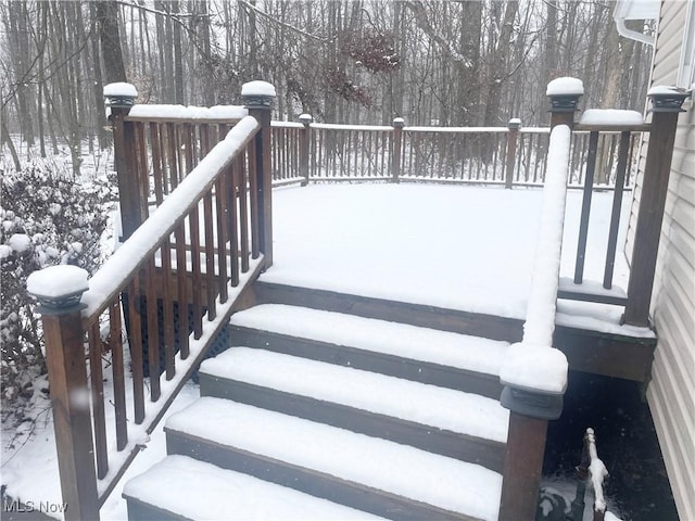 view of snow covered deck