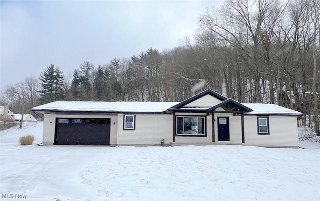 view of front of home featuring a garage