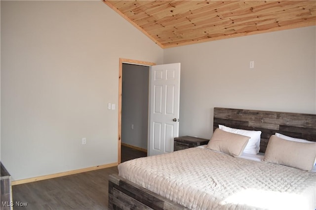 bedroom with dark hardwood / wood-style floors, wooden ceiling, and vaulted ceiling