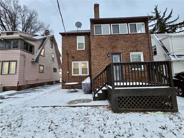 view of snow covered property