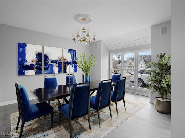 dining area with a chandelier