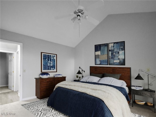 bedroom featuring ceiling fan and lofted ceiling