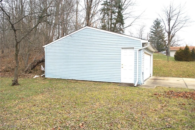 garage with a yard