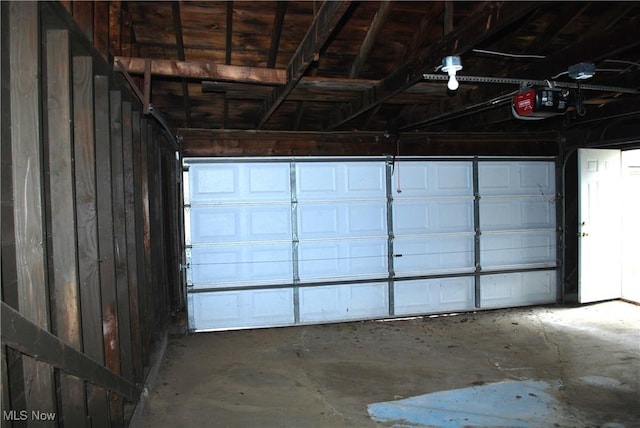 garage featuring a garage door opener