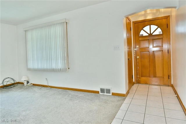 view of tiled foyer