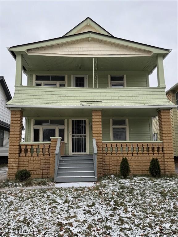 view of property with a porch