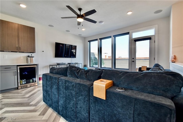 living room with recessed lighting, a ceiling fan, and wine cooler