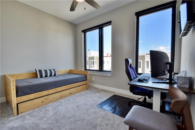 bedroom with baseboards, a ceiling fan, and carpet floors