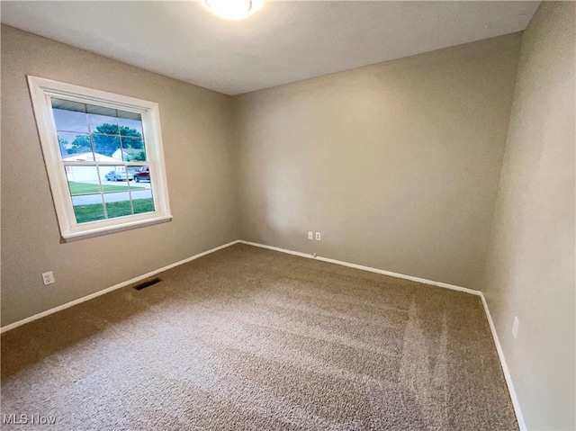 view of carpeted spare room