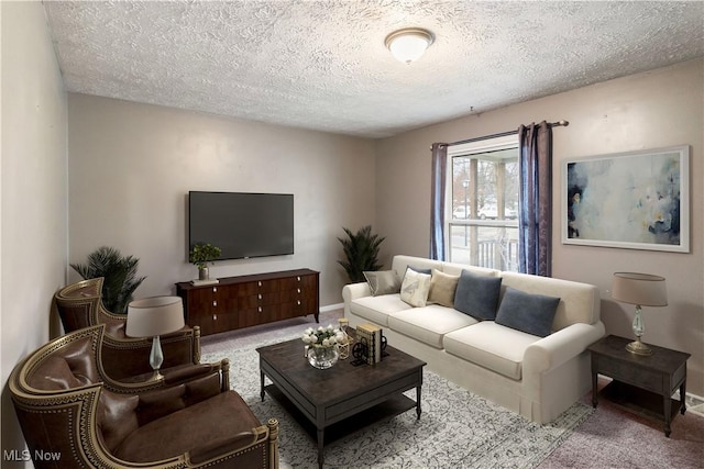 carpeted living room featuring a textured ceiling