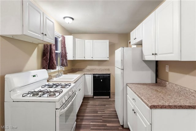 kitchen with white cabinetry, sink, dark hardwood / wood-style floors, and white appliances