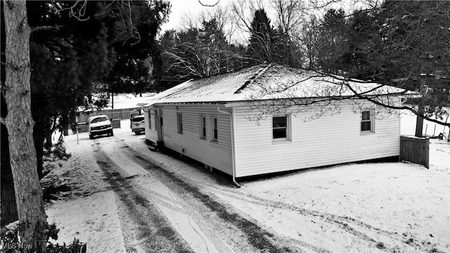 view of snow covered property