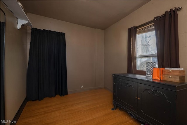 bedroom with light hardwood / wood-style floors