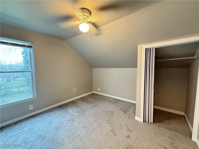 747 Brownell Ave, Lorain, OH 44052 - additional living space featuring baseboards, carpet, vaulted ceiling, and a ceiling fan