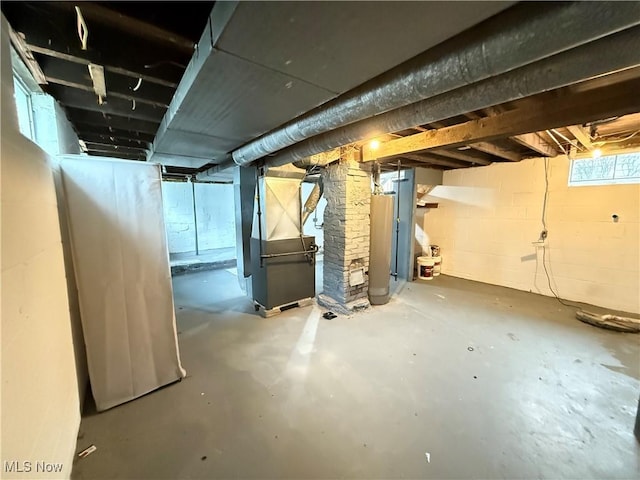 747 Brownell Ave, Lorain, OH 44052 - basement featuring water heater and heating unit