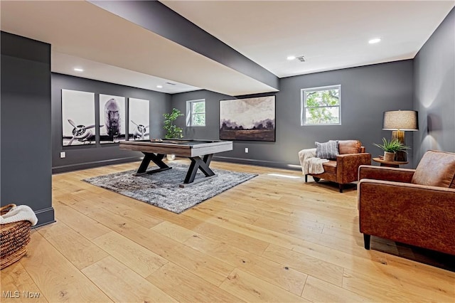 playroom with light wood-type flooring and pool table