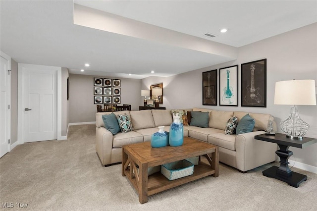 living room with light colored carpet