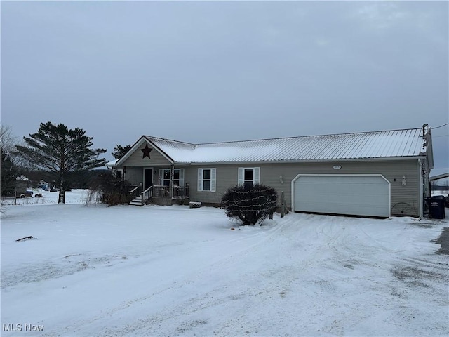 ranch-style home featuring a garage