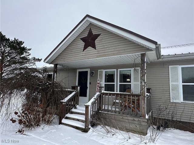 bungalow featuring covered porch